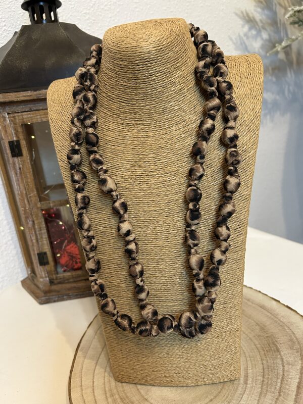 Collar bolas animal print